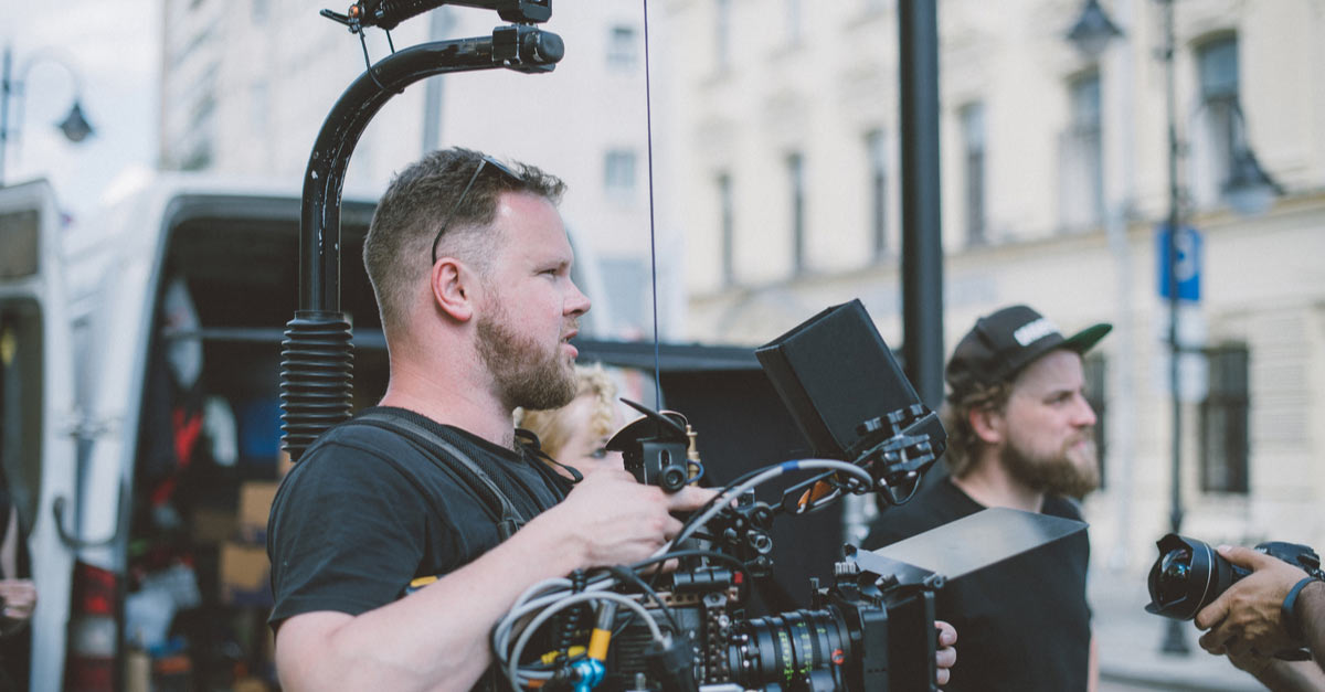 Male Cinematographer shooting on location