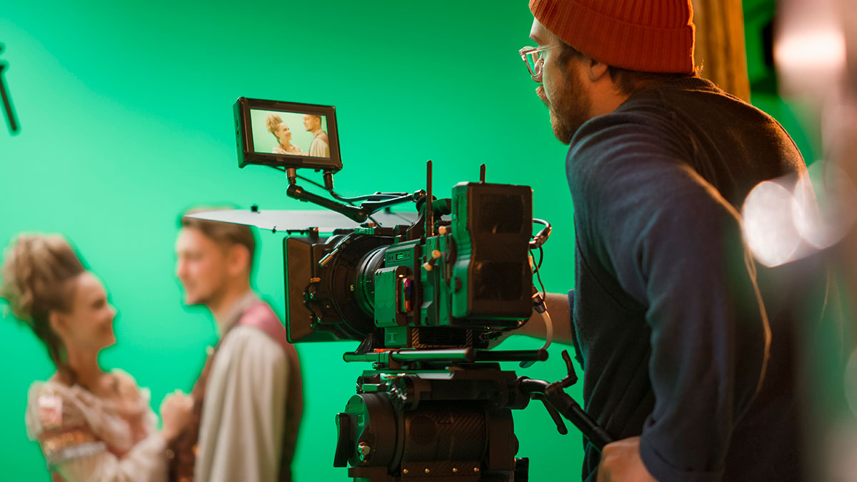 filmmaker on railway trolley shooting the movie